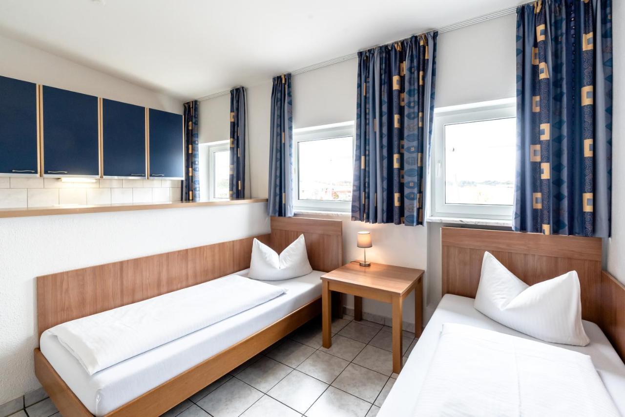 Hotel Fresh Inn Unterhaching Extérieur photo